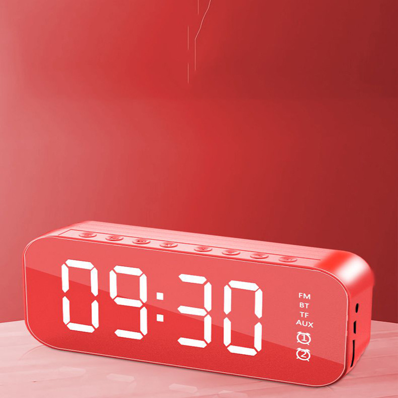 Nuevo reloj despertador Bluetooth audio inalámbrico Tarjeta de radio escritorio mini pequeña pistola acero altavoz espejo teléfono móvil altavoz