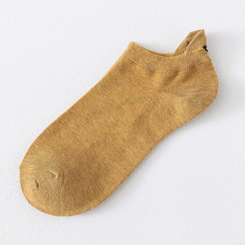 2020 nuevos calcetines de primavera y otoño personalidad japonesa y coreana talón bordado cara sonriente pareja barco Calcetines calcetines de algodón de color sólido ventas directas de fábrica