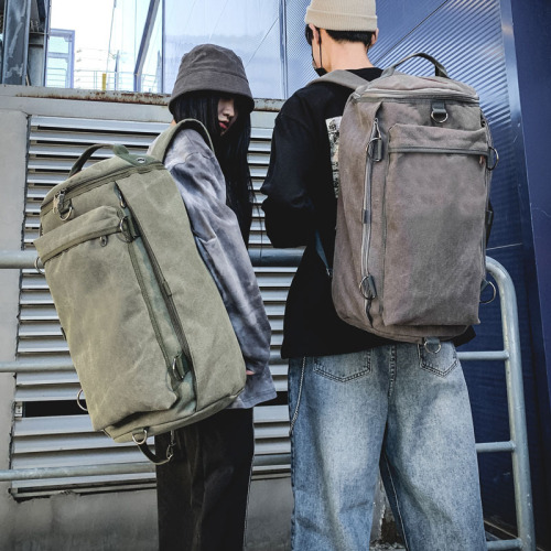 Fashionable men's bag, large capacity travel backpack, men's outdoor travel sports cylinder backpack, trendy canvas school bag