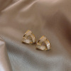 Asymmetrical earrings from pearl, silver 925 sample, simple and elegant design