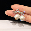 Asymmetrical earrings from pearl, silver 925 sample, simple and elegant design
