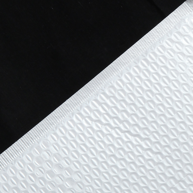 Bolsa de envoltura de burbuja de película nacarada compuesta blanca espuma coextruida engrosada bolsa a prueba de golpes embalaje de ropa bolsa de autosellado