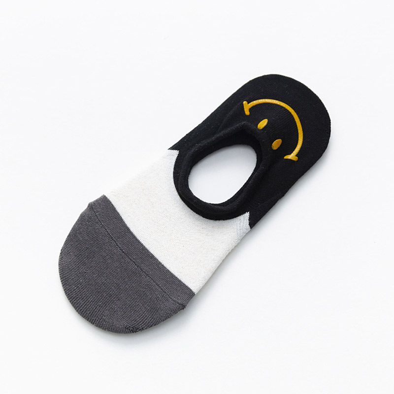 Calcetines de mujer a juego de color de algodón al por mayor con calcetines invisibles de silicona Primavera y verano tacón estampado en caliente cara sonriente calcetines de boca baja