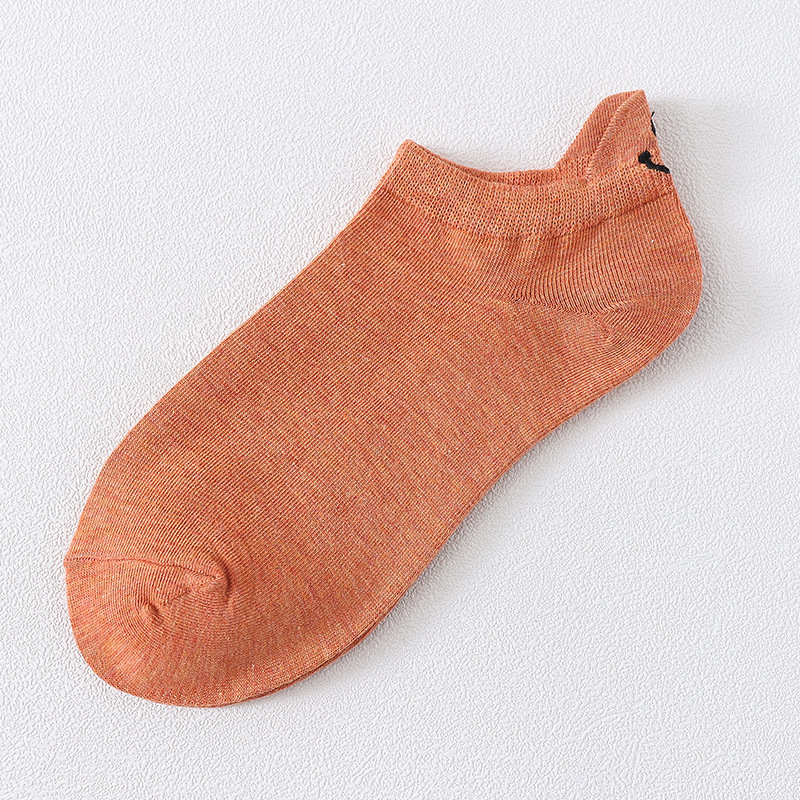 2020 nuevos calcetines de primavera y otoño personalidad japonesa y coreana talón bordado cara sonriente pareja barco Calcetines calcetines de algodón de color sólido ventas directas de fábrica