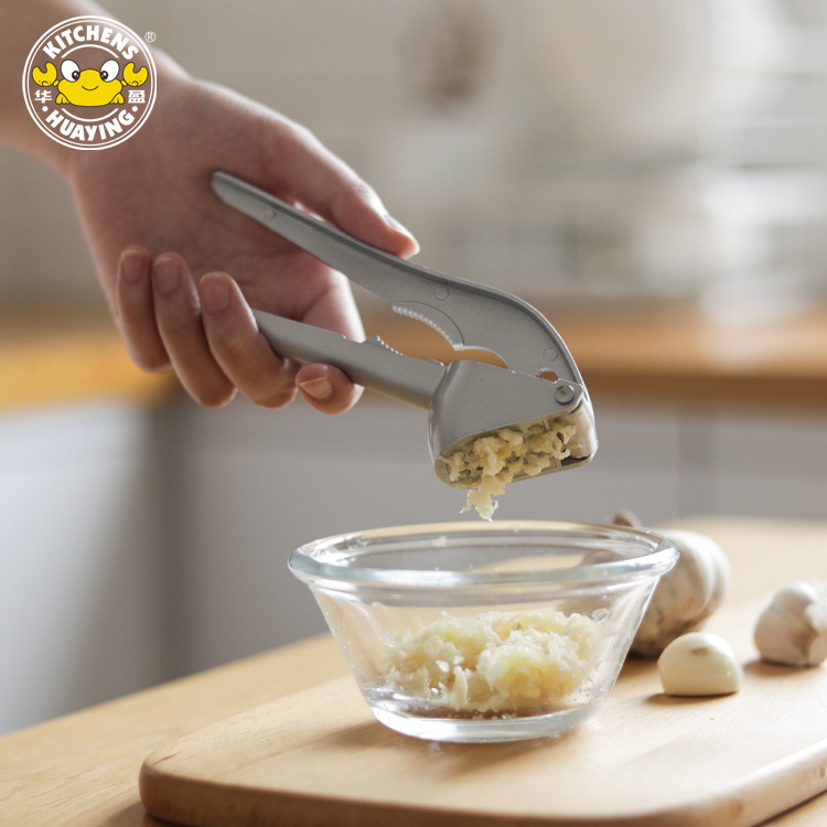 Huaying thickened aluminum alloy garlic press multi-function manual garlic grinder walnut clip kitchen gadget
