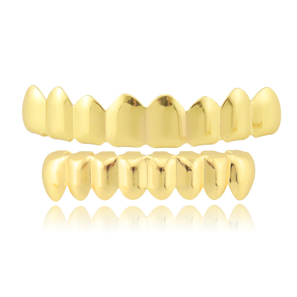 Personalidad europea y americana moda hip hop brackets dientes superiores 8 dientes inferiores 8 18K chapado en oro masculino y femenino suicidio HIPHOP brackets