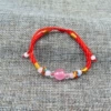 Fuchsia round beads, red rope bracelet