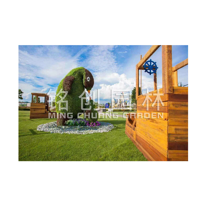 Flor artificial Escultura de arte de talla verde Imagen de animal Día nacional Día nacional Forma de plantación de césped Decoración de planta verde Alta simulación