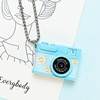 Small camera, necklace, keychain, purse, phone case, accessory, pendant, makes sounds