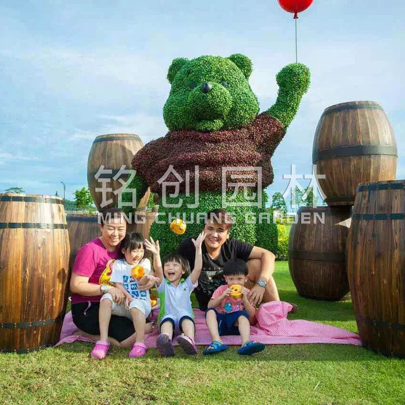 Flor artificial Escultura de arte de talla verde Imagen de animal Día nacional Día nacional Forma de plantación de césped Decoración de planta verde Alta simulación