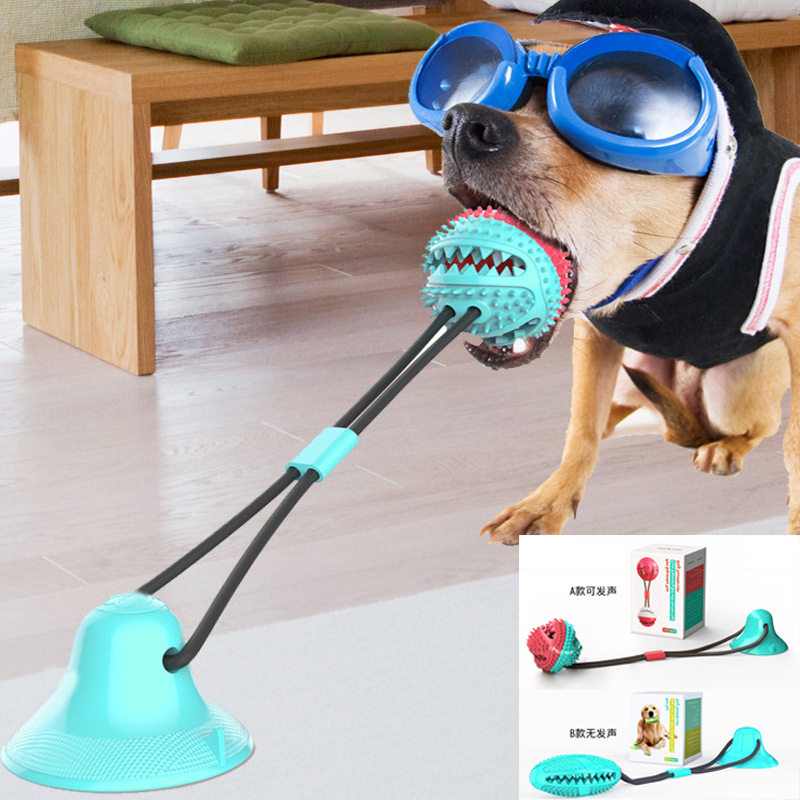 Amazon popular perro de juguete para mascotas molar de fugas de alimentos mordedura de Bell bola interactiva lechón de goma Bola con cordón