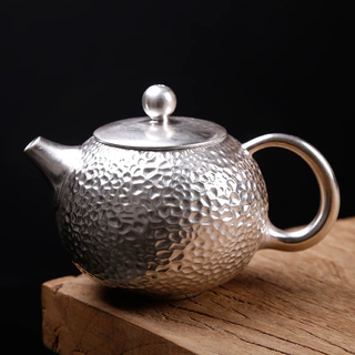 陶瓷鎏银锤纹999纯银西施茶壶茶具家用足银泡茶壶球孔壶手工银壶