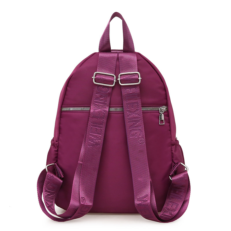 2021 nueva moda simple impermeable mochila de viaje de gran capacidad Mochila casual de nylon de tela Oxford para mujer