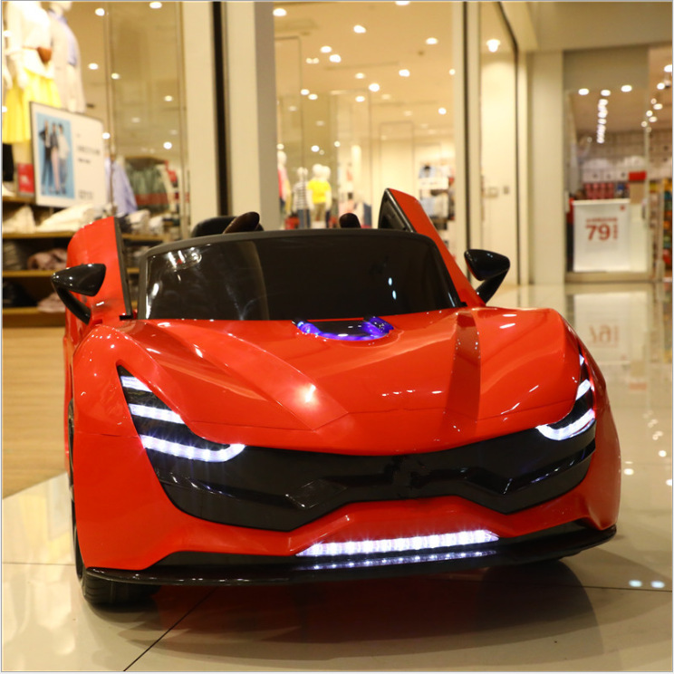 Coche eléctrico para niños coche de control remoto de cuatro ruedas mecedora cochecito de 4 ruedas coche de juguete para niños coche deportivo de carga