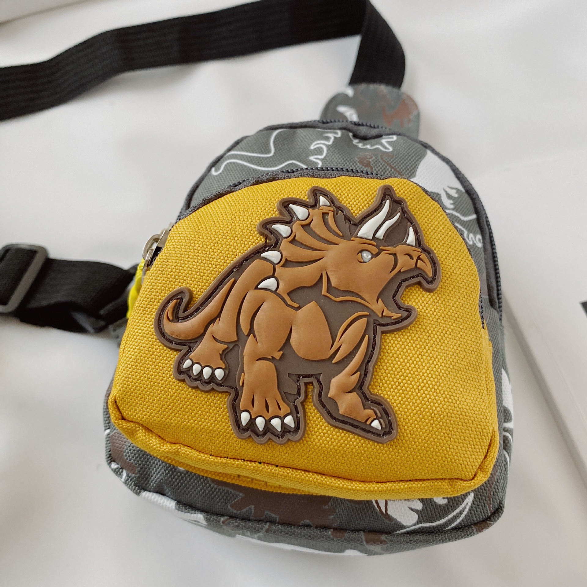 Bolsa de cintura para niños de comercio exterior 2020 nueva bolsa de pecho de dinosaurio lindo camuflaje de dibujos animados bebé crossbody monedero bolso de los niños