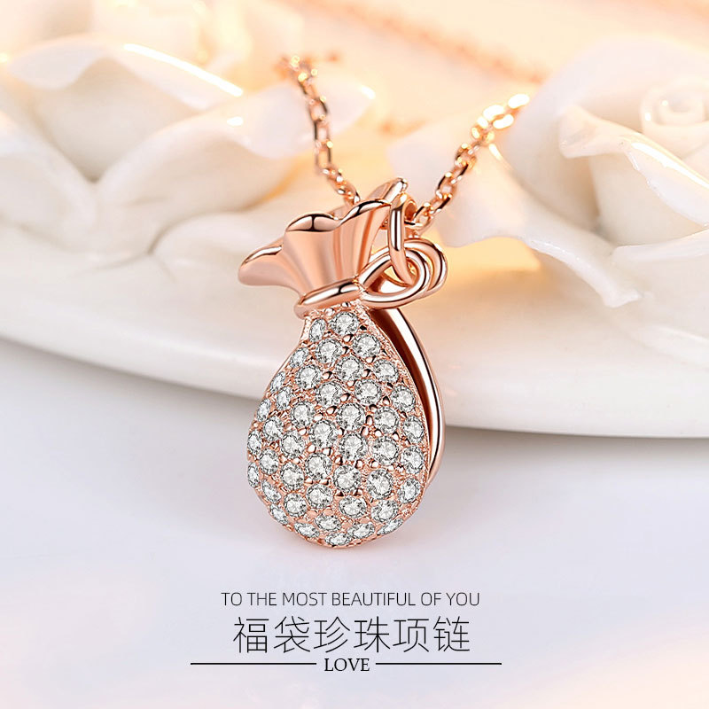 Online celebridad Singapur S925 Lucky Bag collar de diamantes colgante nicho simple perla clavícula cadena femenina