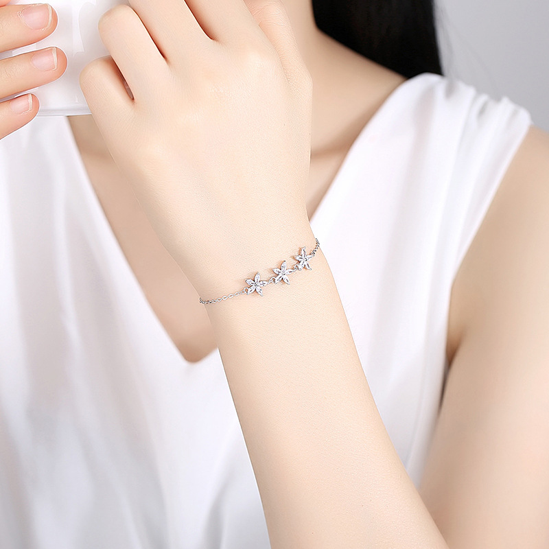 Luz estilo de lujo s925 pulsera de plata esterlina estrella diamante incrustado nicho pulsera de moda simple pulsera de la estrella de las mujeres