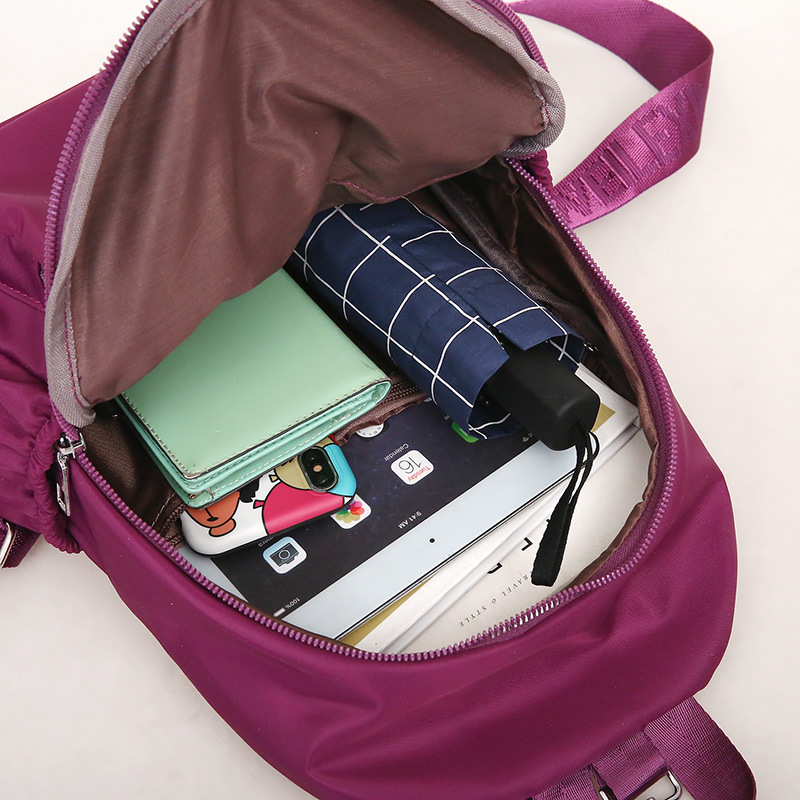 2021 nueva moda simple impermeable mochila de viaje de gran capacidad Mochila casual de nylon de tela Oxford para mujer