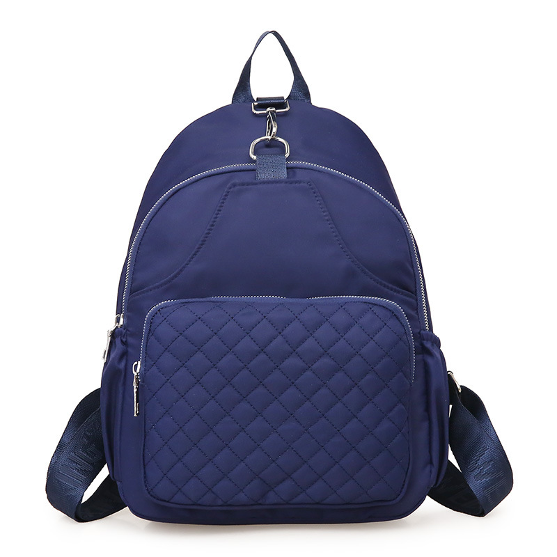 2021 nueva moda simple impermeable mochila de viaje de gran capacidad Mochila casual de nylon de tela Oxford para mujer