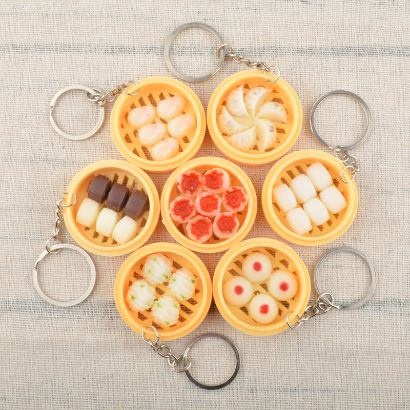 Stall hot selling creative simulation food key chain pendant mini steamer steamed stuffed bun steamed wheat flower roll schoolbag pendant