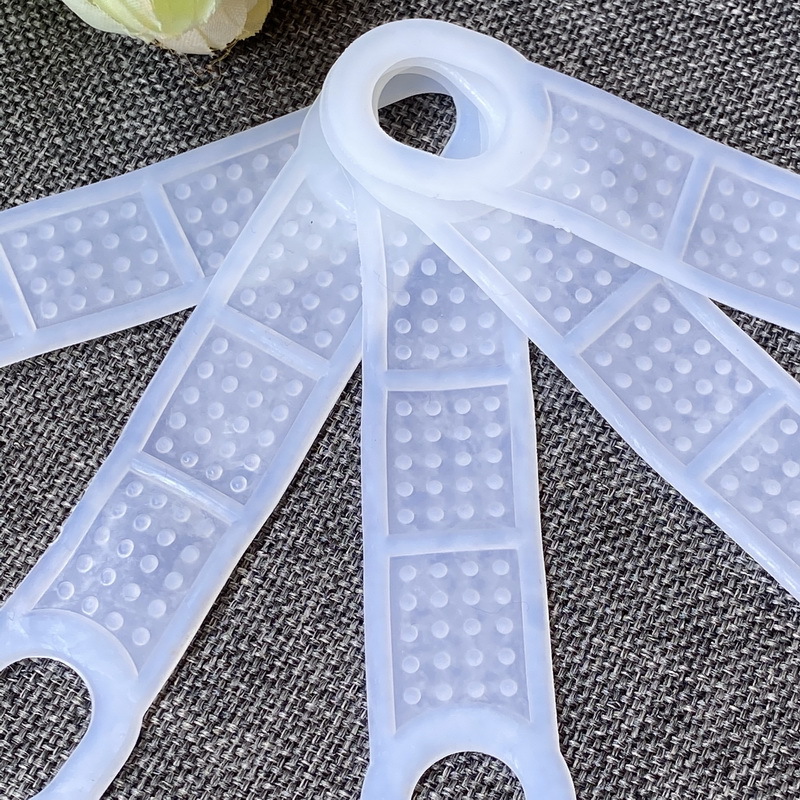 Percha de ropa directa de fábrica especial grande silicona doble agujero antideslizante tira alta transparente doble agujero silicona antideslizante cubierta antideslizante cuero