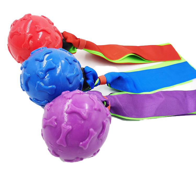 Fábrica directa para perro mordedura-resistente sonido juguetes TPR cinta hueso bola mascotas suministros en stock al por mayor