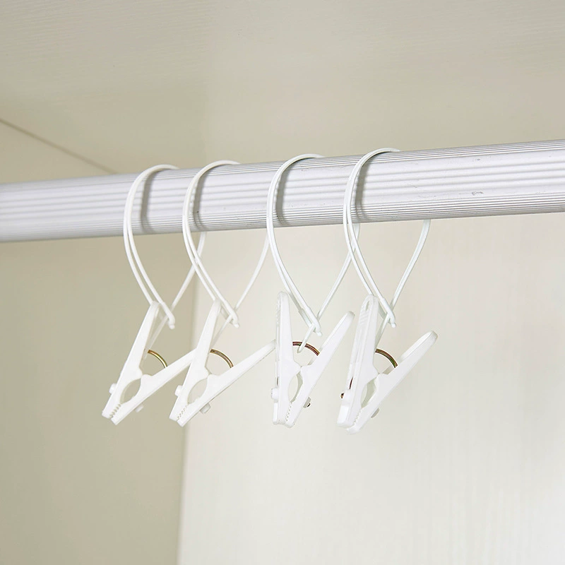 Windproof universal handheld plastic hanger for traveling, towel, socks, drying rack