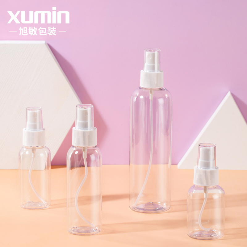 En stock 100ml de hombro redondo transparente botella de rocío puro blanco rayado botella de spray de tóner botella de spray de sub-embalaje Xumin material de embalaje