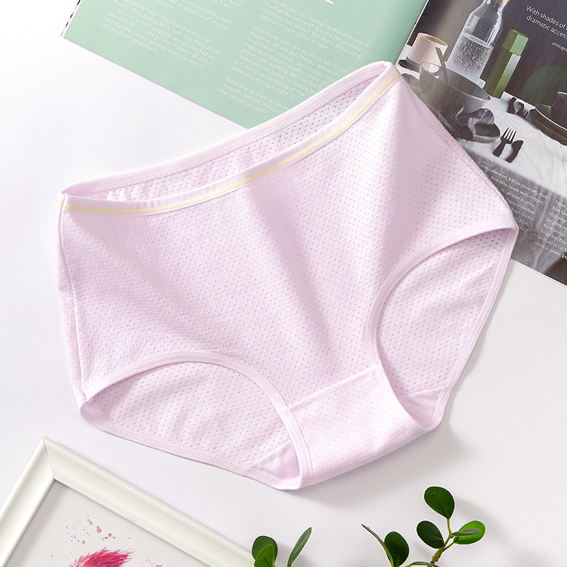 Ropa interior de niña japonesa simple color sólido ropa interior de algodón transpirable calzoncillos de algodón de cintura media para mujer al por mayor