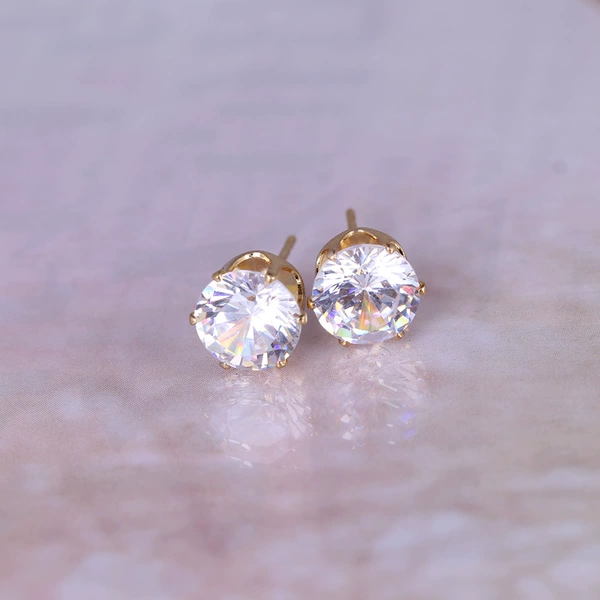 With zircon, golden
