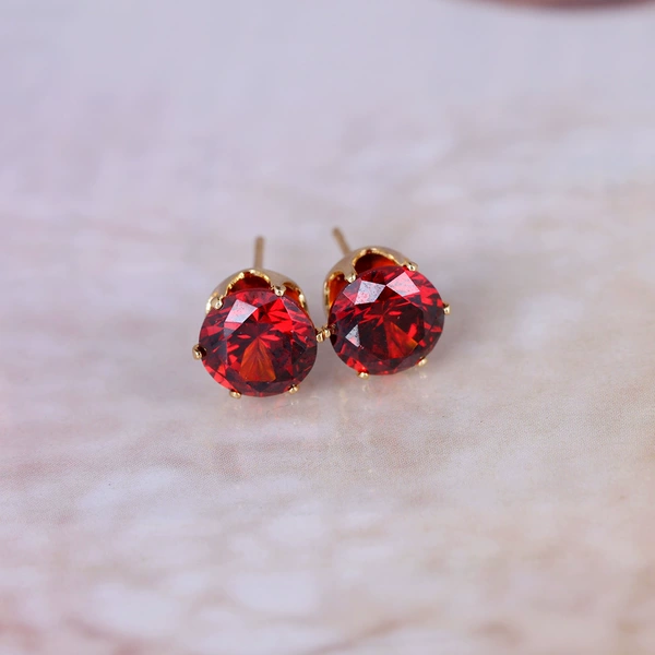 With zircon, golden