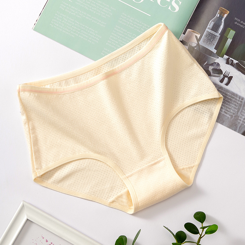 Ropa interior de niña japonesa simple color sólido ropa interior de algodón transpirable calzoncillos de algodón de cintura media para mujer al por mayor