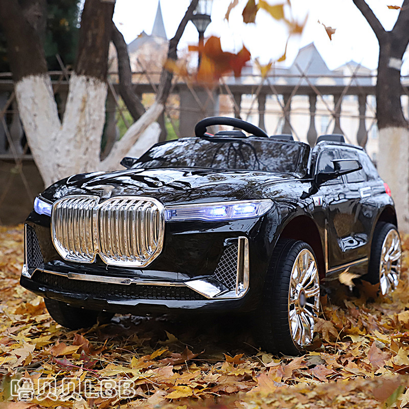 Nuevo doble unidad de control remoto coche de juguete eléctrico bebé puede sentarse coche de cuatro ruedas con columpio cochecito de juguete