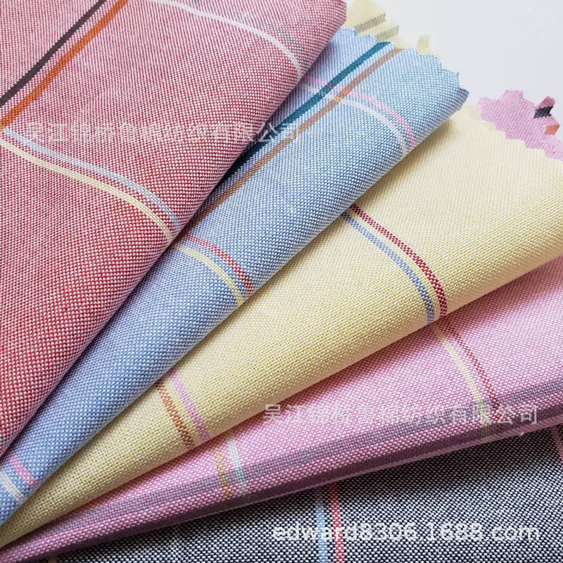 全棉色织牛津纺40+40*21/2 100*50青年布波点印花水洗扎染拉毛布