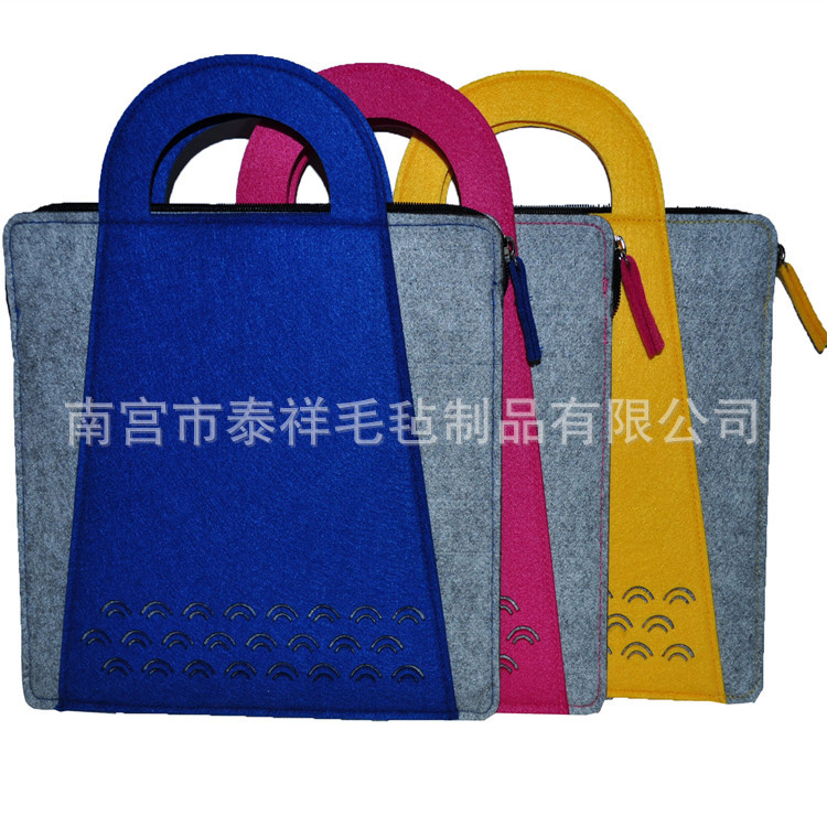 供应镂空平板电脑手提包手提袋 毛毡手提收纳包 毛毡材料
