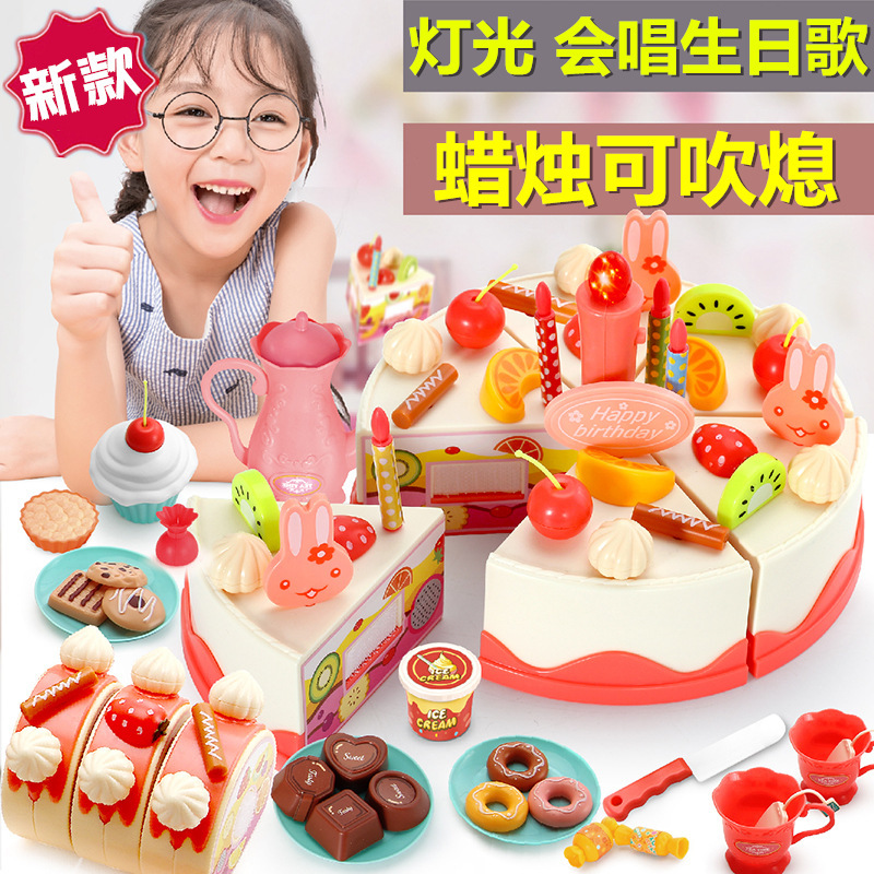 Niños transfronterizos 82 piezas de sonido eléctrico y luz inducción DIY fruta corte música pastel de cumpleaños juguete juego casa traje
