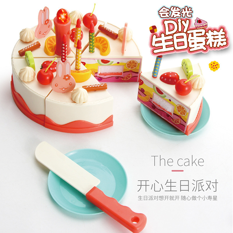 Niños transfronterizos 82 piezas de sonido eléctrico y luz inducción DIY fruta corte música pastel de cumpleaños juguete juego casa traje