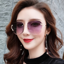 无框切边太阳镜女士韩版潮波浪纹新款时尚街拍眼镜女海洋片墨镜