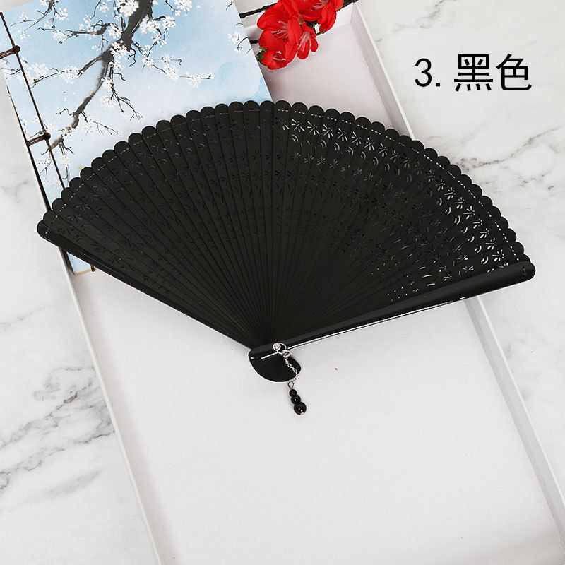 Estilo chino tallado hueco-hacia fuera de bambú ventilador de estilo japonés plegable ventilador portátil de estilo antiguo de las mujeres al por mayor ventilador de la danza