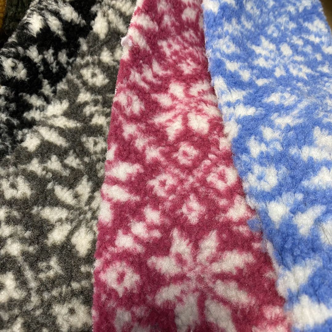 Jacquard lana de cordero nuevo camuflaje animal de tres colores tela de ropa de juguetes de cachemira