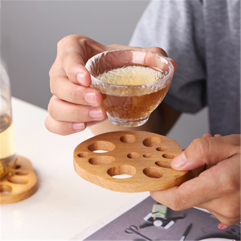 En stock creativo taza estera de madera de aislamiento de kung fu taza de té titular de la raíz de loto de haya pieza de montaña estufa hirviendo taza de té estera