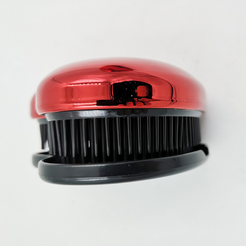 Fábrica al por mayor plástico peine Shunfa huevo peine creativo portátil cojín de aire masaje peine plástico peine en forma de corazón shunfa peine