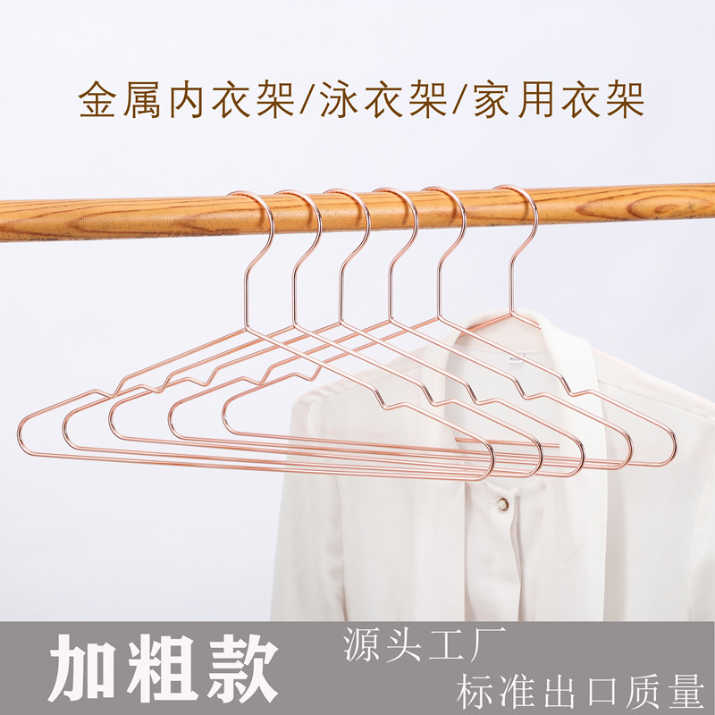 Estilo nórdico percha de ropa de metal antideslizante sin costuras percha de ropa de nueve hoyos galvanoplastia percha de ropa para el hogar percha de ropa de triángulo de oro rosa