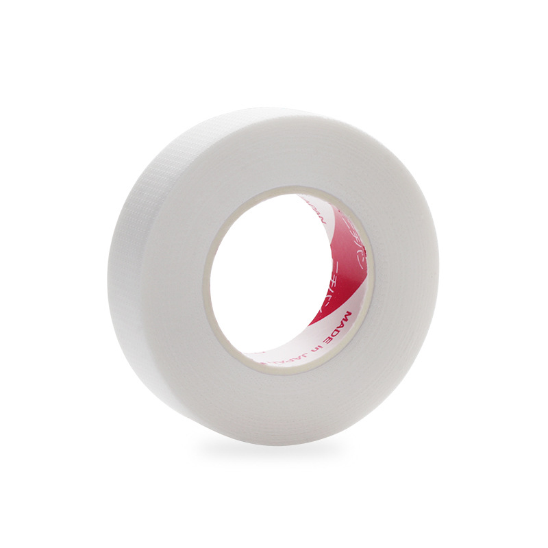 Venta al por mayor Injerto de pestañas cinta japonesa plantación de aislamiento de pestañas tela no tejida con agujeros cinta transpirable cinta de pestañas