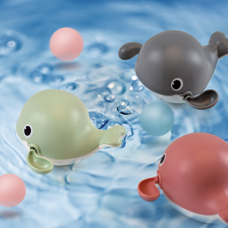 Juguetes de agua para niños nuevo animal pequeña ballena flotante giratoria reloj sinuoso baño juguetes de baño de agua