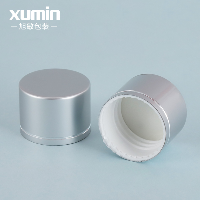 En stock asiático cubierta de plata cosméticos botella de aluminio de rocío puro viaje conveniente sub-botella de tóner Xumin material de embalaje