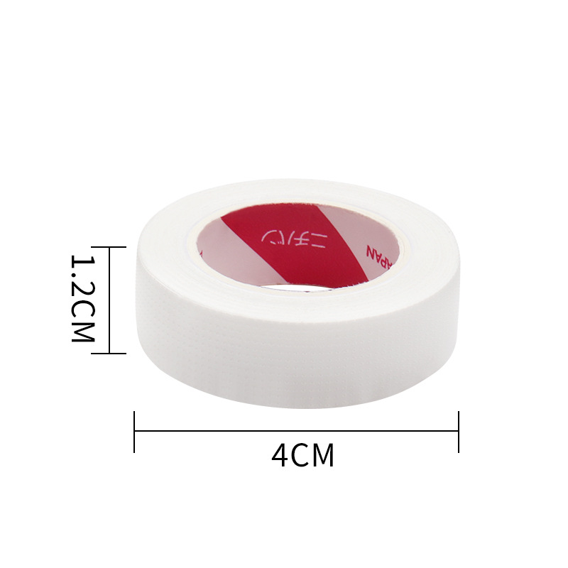 Venta al por mayor Injerto de pestañas cinta japonesa plantación de aislamiento de pestañas tela no tejida con agujeros cinta transpirable cinta de pestañas