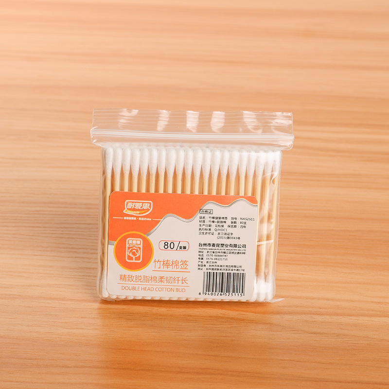 Limpieza doméstica desechable de doble cabeza bastoncillo de bambú bastoncillo de algodón limpieza sanitaria del oído bolsa de nariz carga y descarga maquillaje hisopo de algodón al por mayor