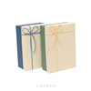 Rectangular festive gift box with bow