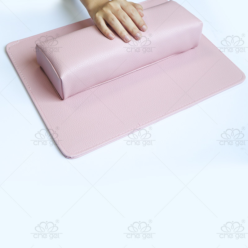 Cojín de mano de manicura transfronteriza almohadilla de mano traje fototerapia pegamento de aceite de uñas cuero de PU patrón de lichí rectangular almohadilla de herramientas lavable
